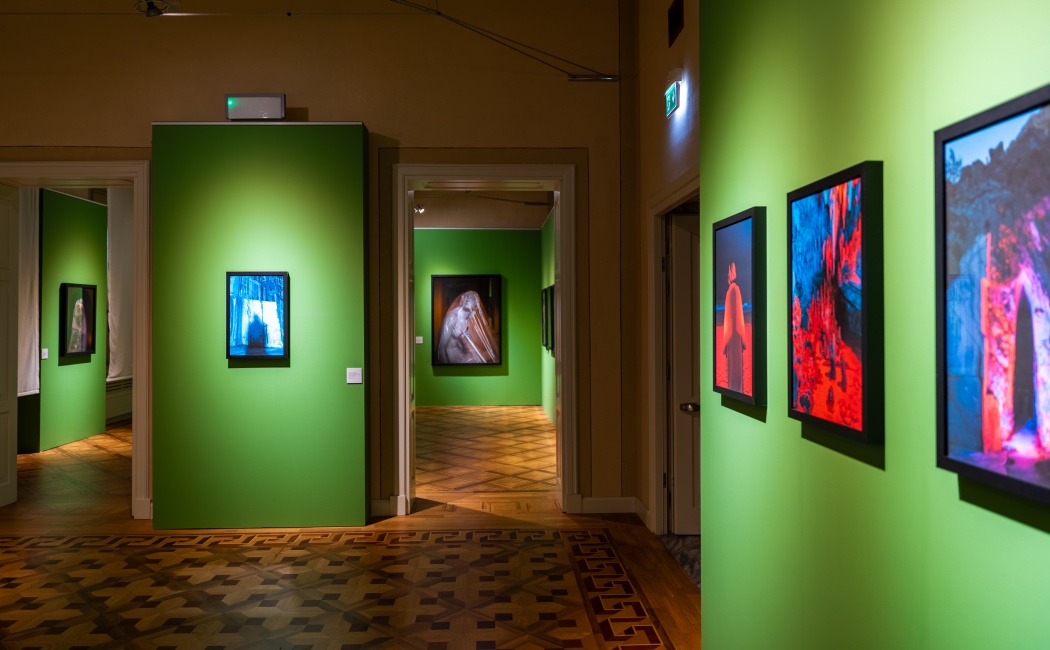 Installation view of "White Carrara" - Palazzo Binelli, Curated By Claudio Composti, Carrara - IT. In the background, in the back room, photos by Simon Roberts. Photo by  Giuseppe D'Aleo